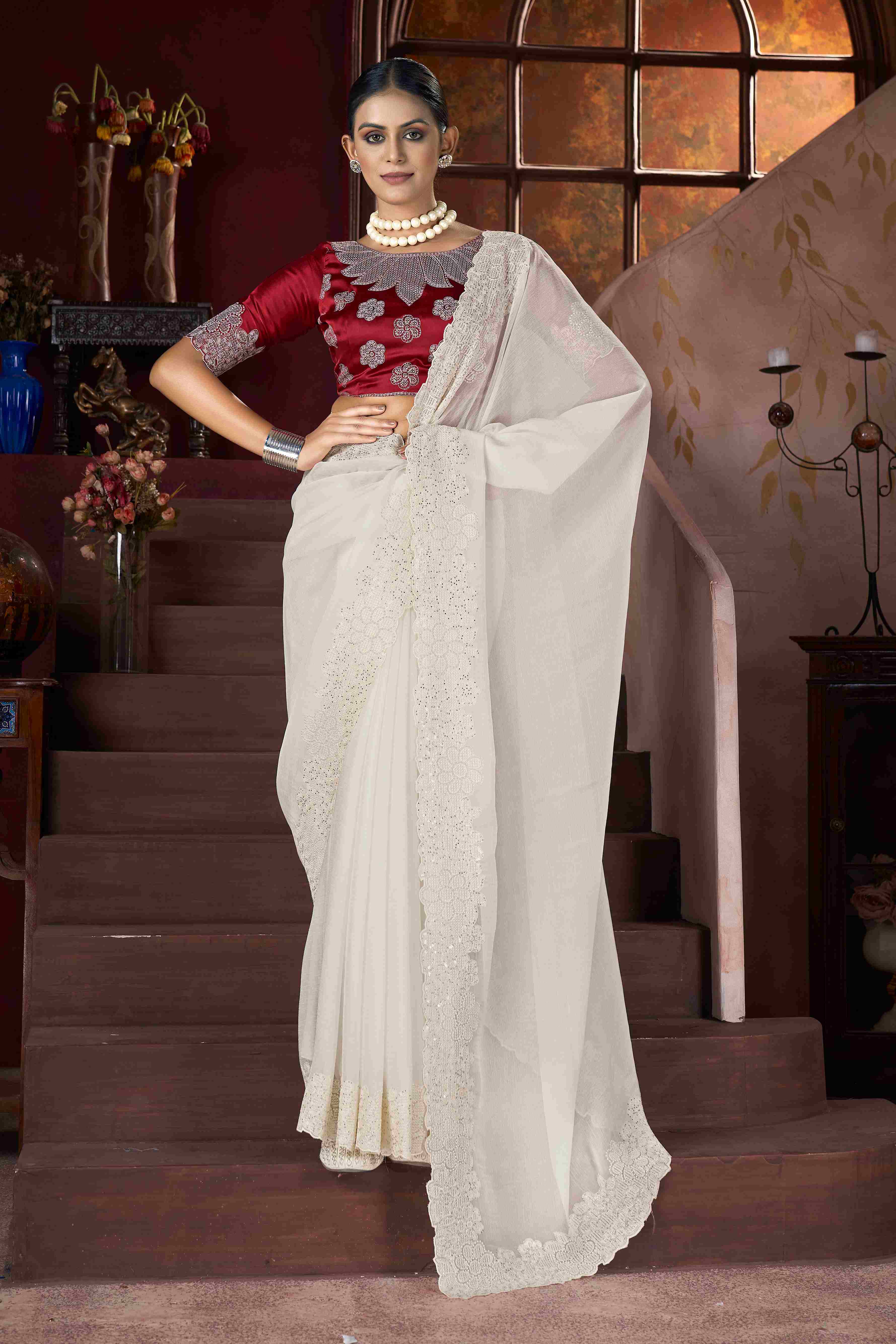 Elevate Your Style with Our Exquisite White Embroidery Saree 